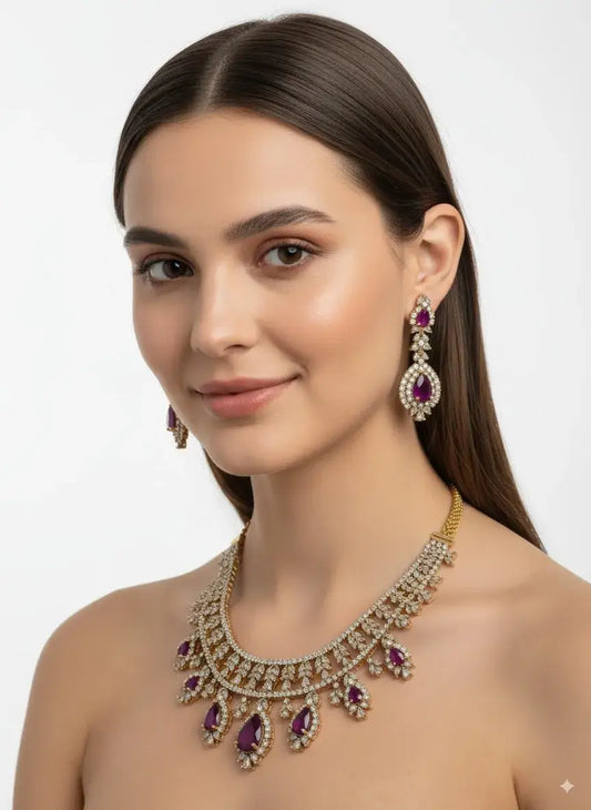 Model wearing a Purple Stone CZ Necklace Set with Earrings featuring bold purple gemstones and CZ stones.