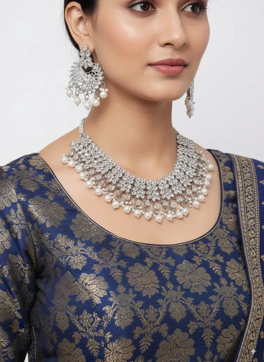 CZ Diamond Bridal Pearl Choker Necklace Set with Earrings on a model, showcasing intricate design and dazzling pearls.
