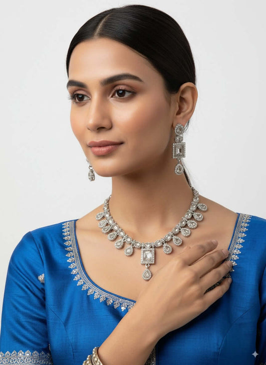 Square-Cut CZ Diamond Necklace Set with Matching Earrings, model wearing jewelry set with blue outfit.