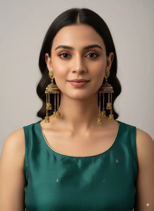 Antique Gold Multi-Layered Long Jhumka Earrings with Hanging Chains – Bridal & Festive Wear worn by model.