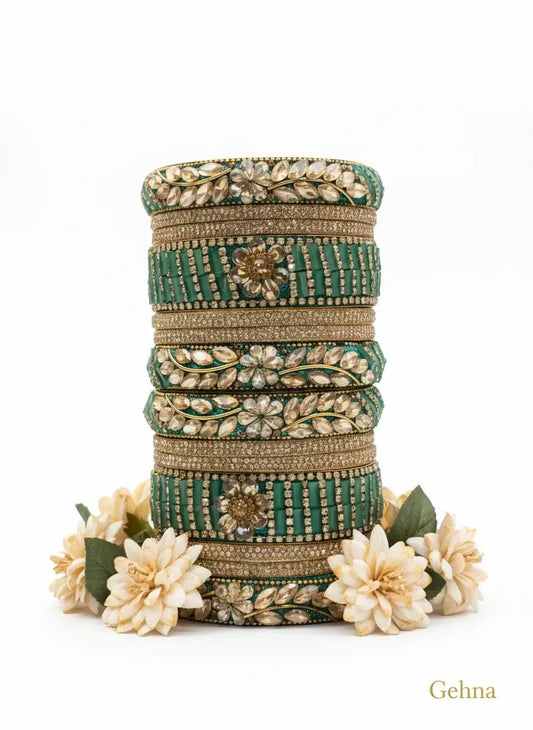 Dark Green Bridal Kundan Bangles Set – Gehna featuring floral motifs and sparkling stones for elegant bridal wear.