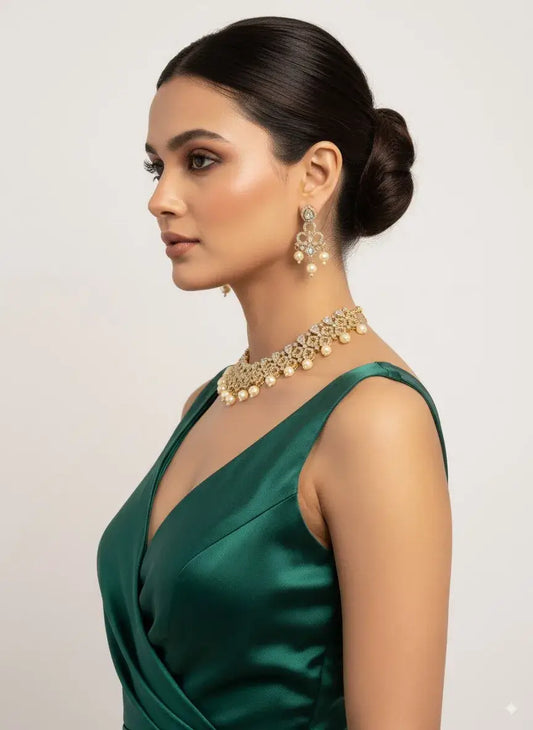 CZ Pearl Drop Choker Necklace Set with Earrings worn by a model in a green dress, showcasing elegance and style.