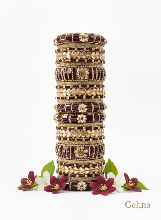 Maroon Gold Bridal Bangle Set – 26 Piece Kundan & Stone Work featuring elegant stone embellishments.