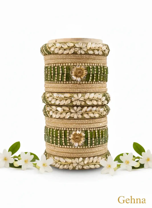 Green Bridal Chuda Set for Wedding | Gehna featuring floral detailing and sparkling stones.