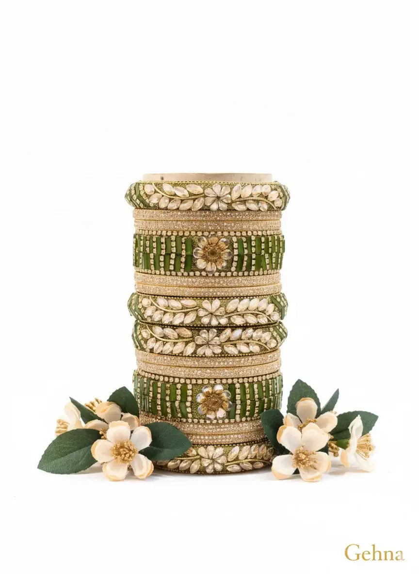 green bridal chuda set for wedding | gehna with floral detailing and sparkling stones, perfect for bridal elegance.