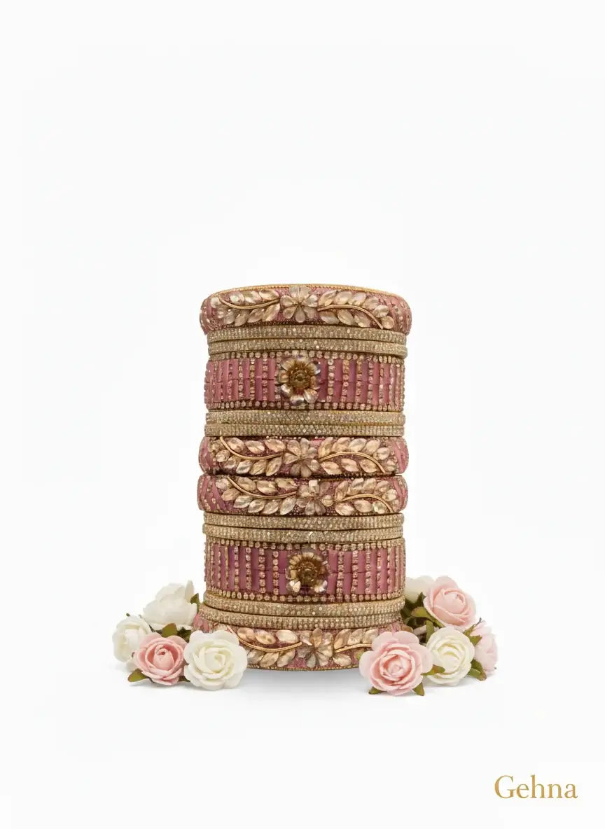 Pink Bridal Kundan Floral Bangles Set – Gehna displayed with floral accents on a white background.