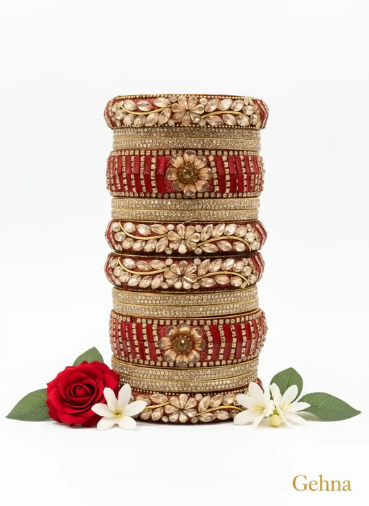 Red Bridal Kundan Floral Bangles Set – Gehna featuring floral motifs and kundan stones, ideal for weddings and celebrations.